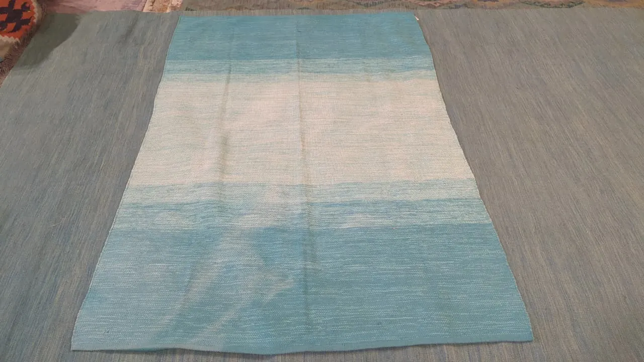 Tapis tissé bicolore, dégradé turquoise