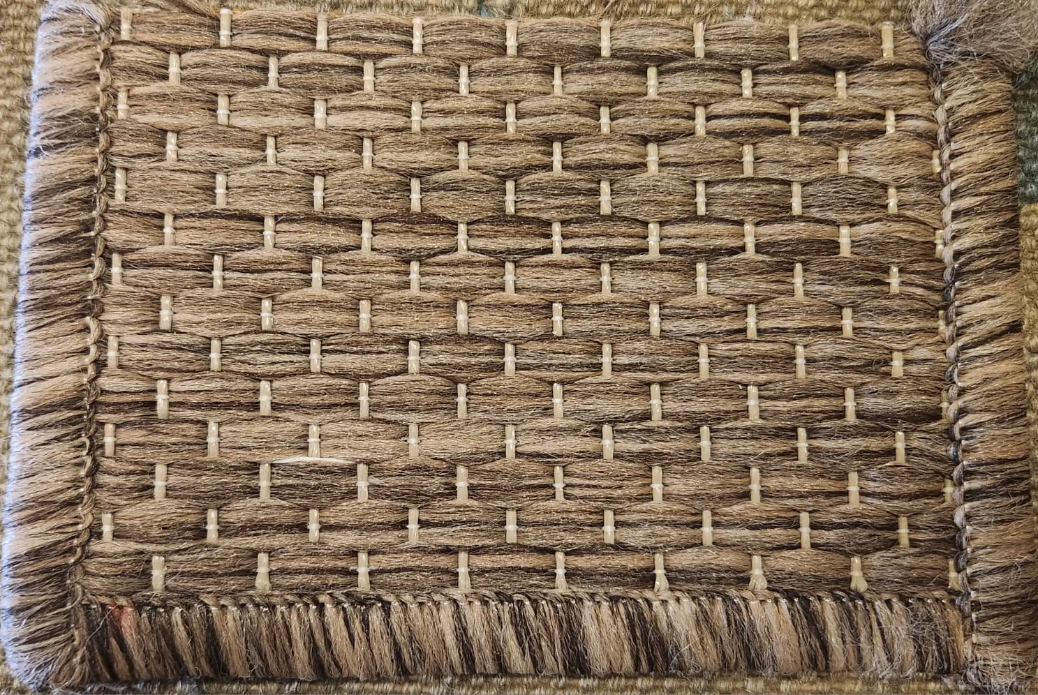 Tapis en fibre naturelle tressée, bordure franges